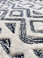 Handmade 6ft and 8 ft round geometric pattern black ivory modern hand tufted rug for living room, bedroom and dining area