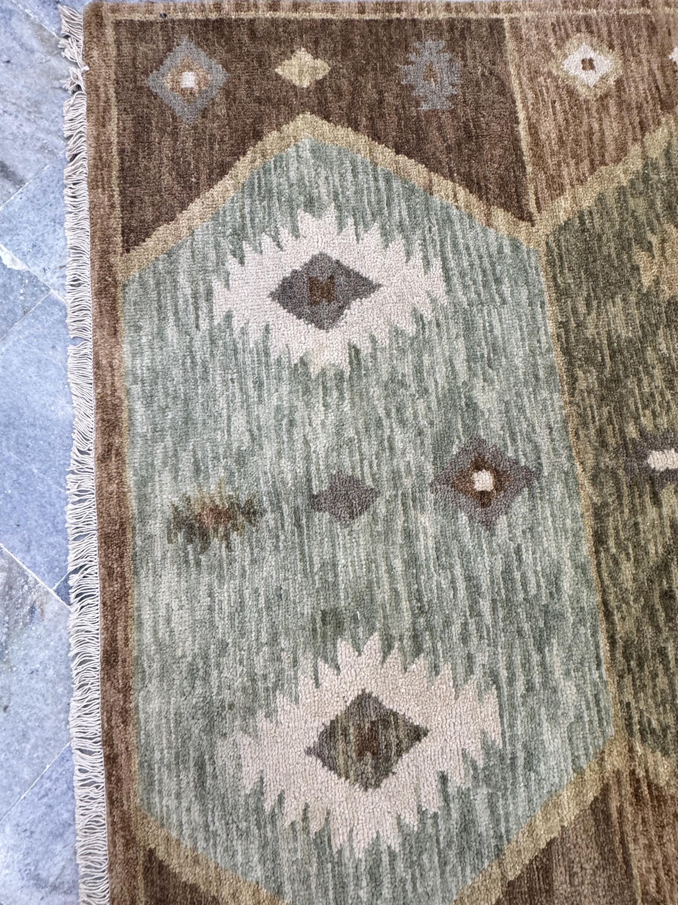 5x8 Hand Knotted Navajo Tribal Geometric Area Rug | Earth Tones, Brown, Sage Green, & Ivory Wool for living room