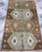 5x8 Hand Knotted Navajo Tribal Geometric Area Rug | Earth Tones, Brown, Sage Green, & Ivory Wool for living room